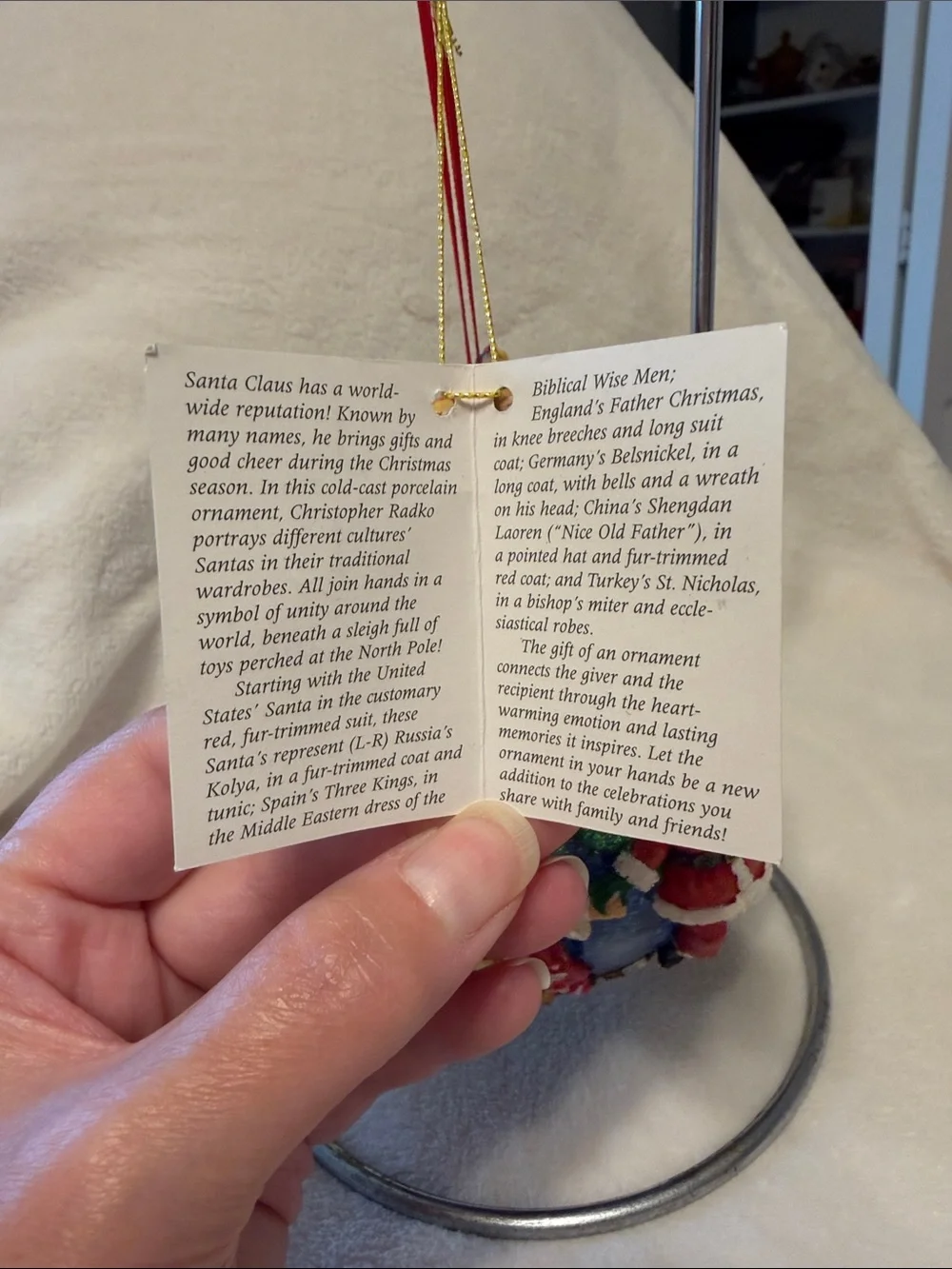 Christopher Radko Santa’s around the world with tag